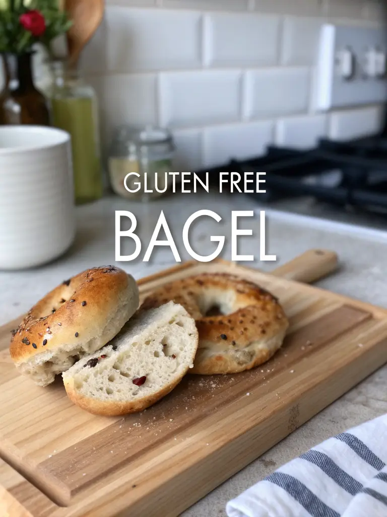 Sliced gluten free bagel on a board with nutrition info