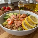Healthy salmon quinoa bowl with fresh toppings